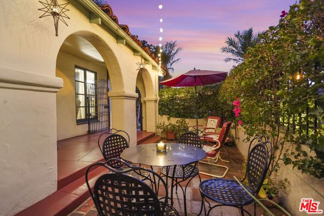 a front view of a house with a glass door
