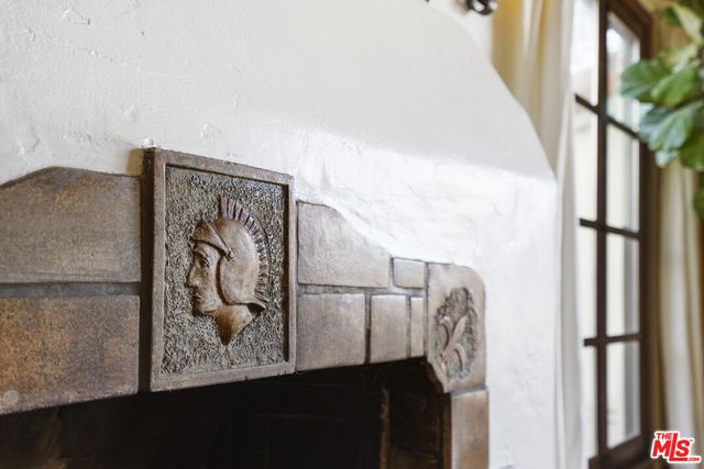 a large kitchen with stainless steel appliances granite countertop a sink and cabinets