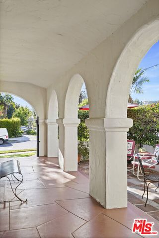 a view of a chairs with a table and chairs