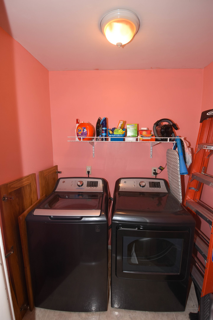 610 North Main Street Le Roy, IL 61752 - Photo 13 of 22 a view of a microwave and stove in a room