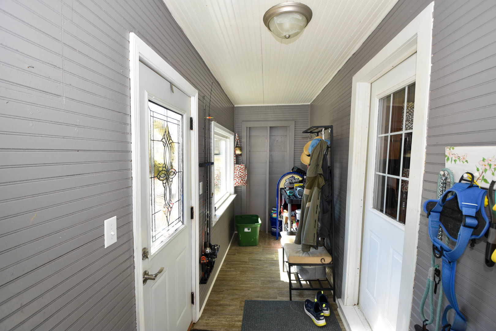 610 North Main Street Le Roy, IL 61752 - Photo 21 of 22 a view of a hallway with wooden floor and windows