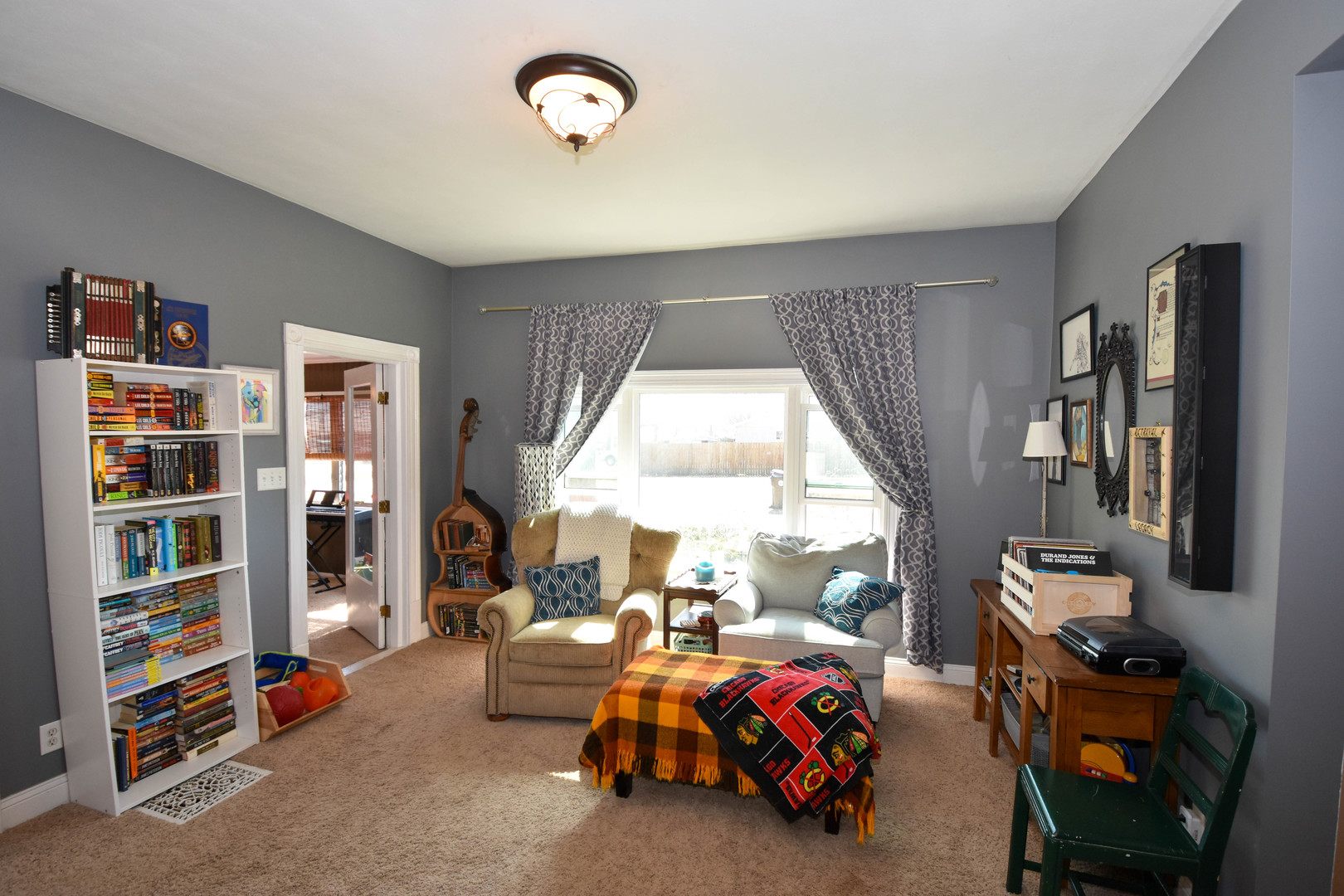 610 North Main Street Le Roy, IL 61752 - Photo 7 of 22 a view of a livingroom with furniture and a large window
