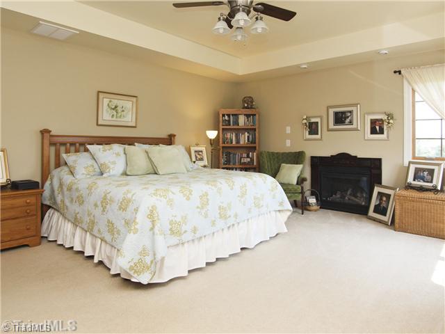 5839 Billet Road Oak Ridge, NC 27310 - Photo 10 of 16 Master Bedroom. Master Bedroom with 2nd fireplace