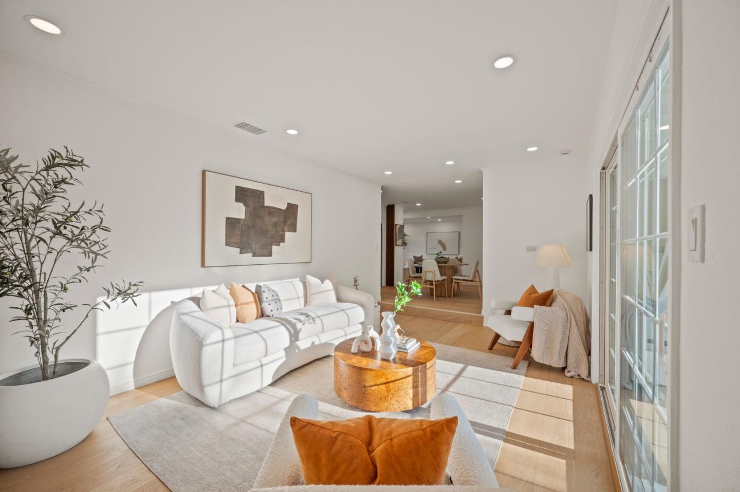 3735 Ruther Pl Way San Jose, CA 95121 - Photo 17 of 38 a living room with furniture and a couch