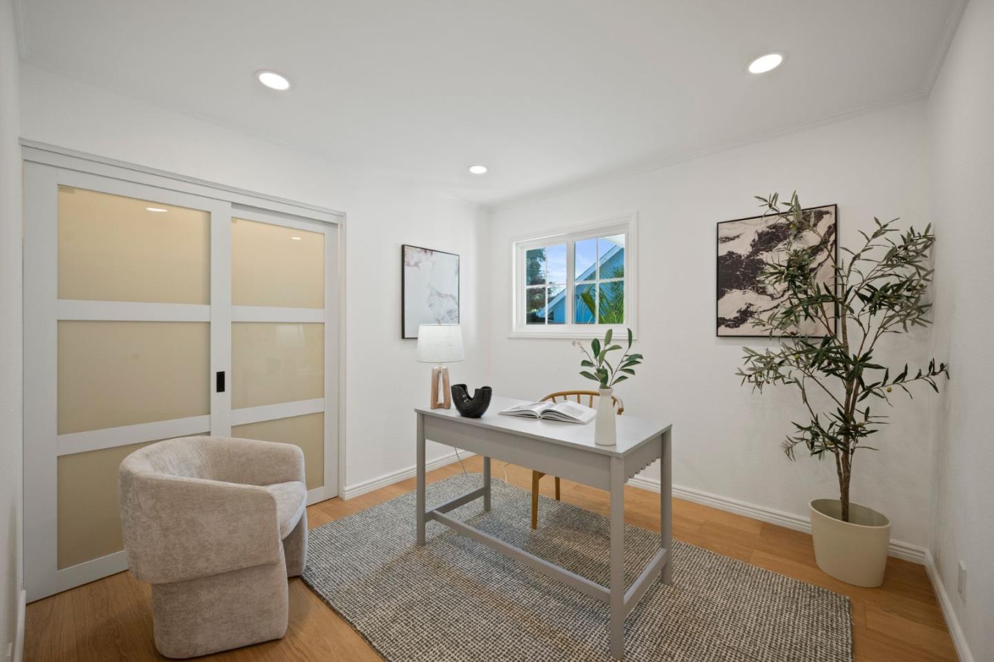3735 Ruther Pl Way San Jose, CA 95121 - Photo 19 of 38 a living room with furniture and a potted plant