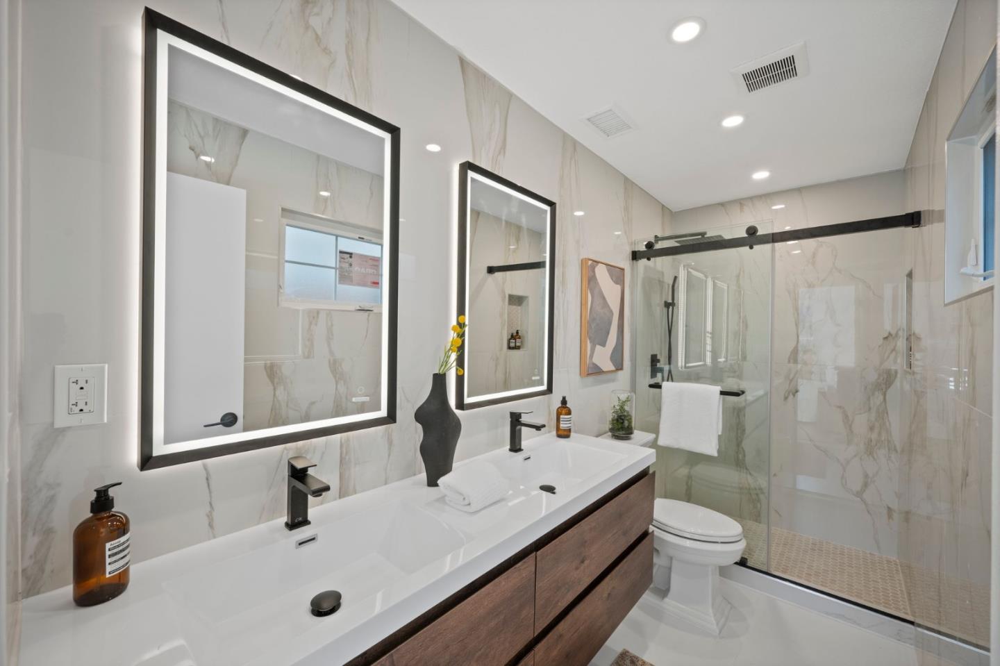 3735 Ruther Pl Way San Jose, CA 95121 - Photo 26 of 38 a bathroom with a sink a toilet and shower