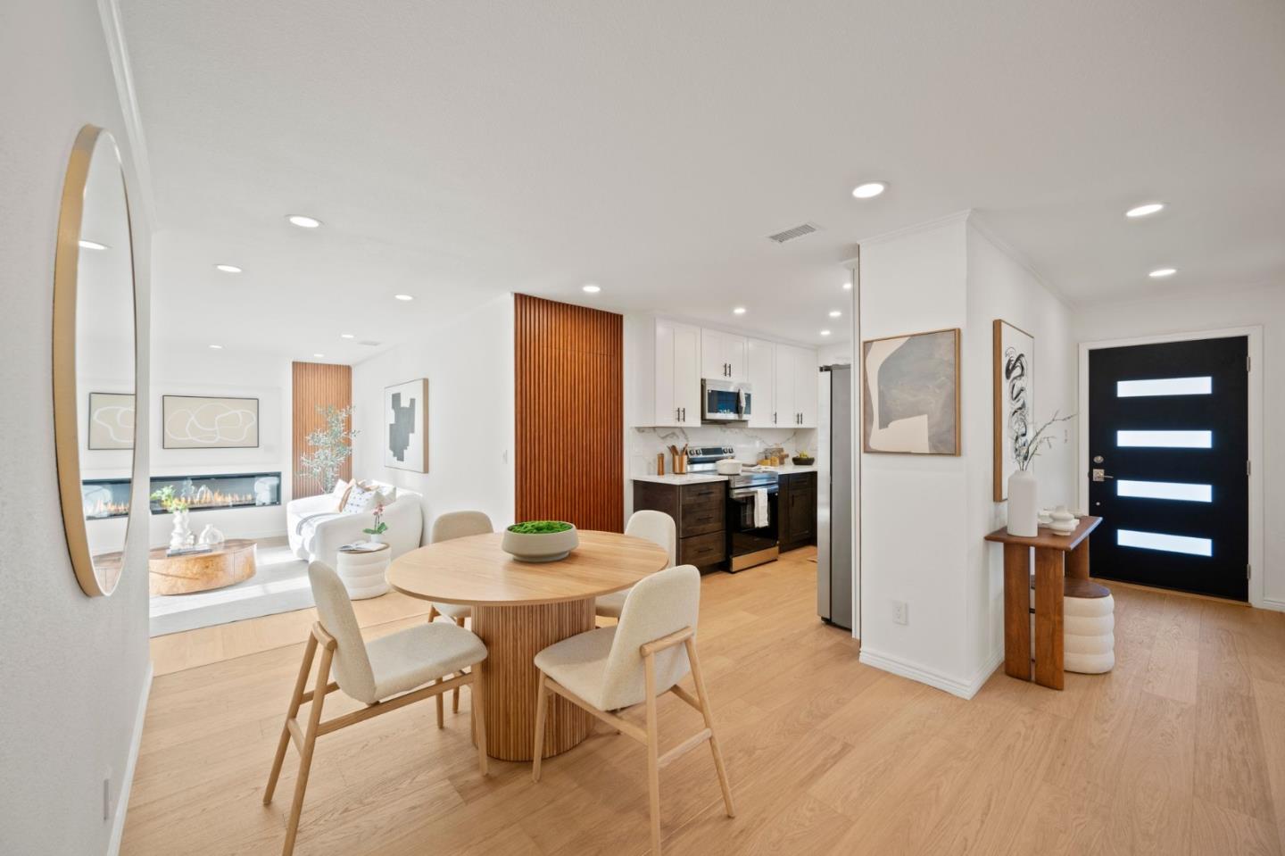 3735 Ruther Pl Way San Jose, CA 95121 - Photo 7 of 38 a kitchen with stainless steel appliances kitchen island granite countertop a refrigerator and cabinets