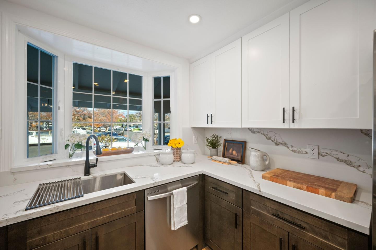3735 Ruther Pl Way San Jose, CA 95121 - Photo 10 of 38 a kitchen with a sink and cabinets