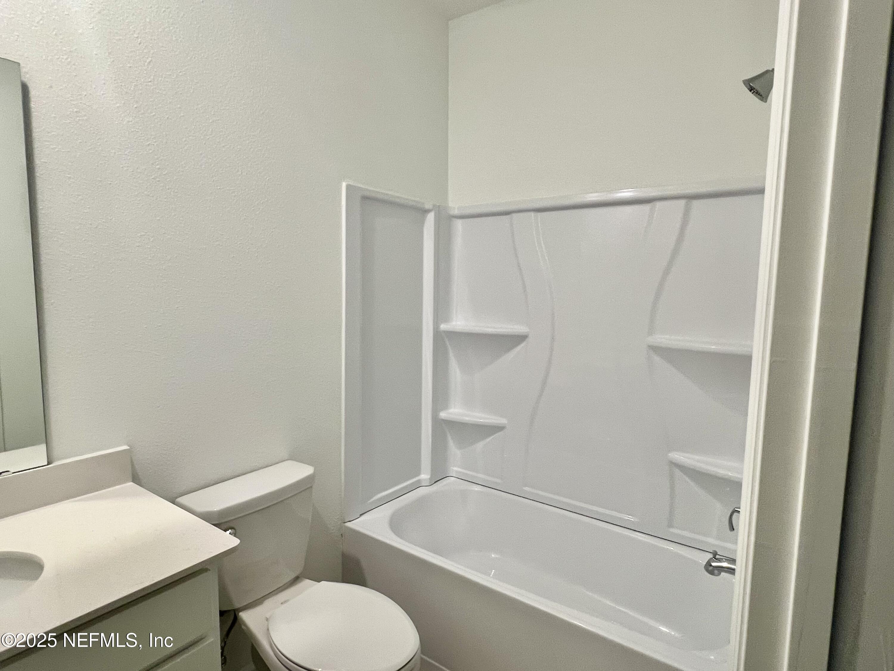 1586 Lachlan Circle Jacksonville, FL 32218 - Photo 13 of 16 a bathroom with a sink and a toilet