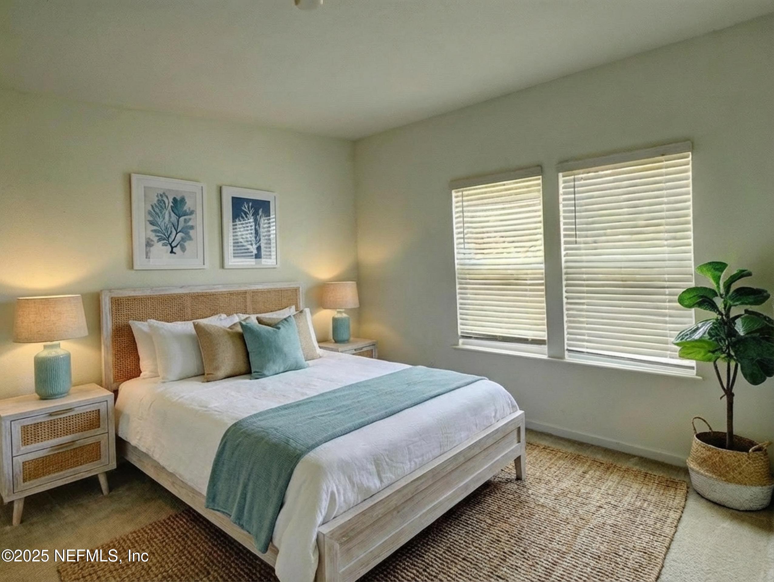 1586 Lachlan Circle Jacksonville, FL 32218 - Photo 8 of 16 a bedroom with bed plant and window