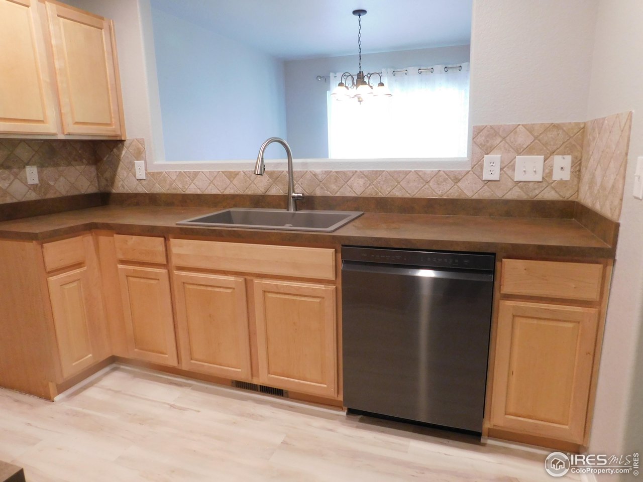 5115 Old Mill Road Fort Collins, CO 80528 - Photo 8 of 41 Upgraded sink, dishwasher, flooring