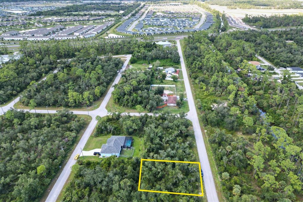 2157 Tea Street Port Charlotte, FL 33948 - Photo 2 of 3 a view of a yard with plants