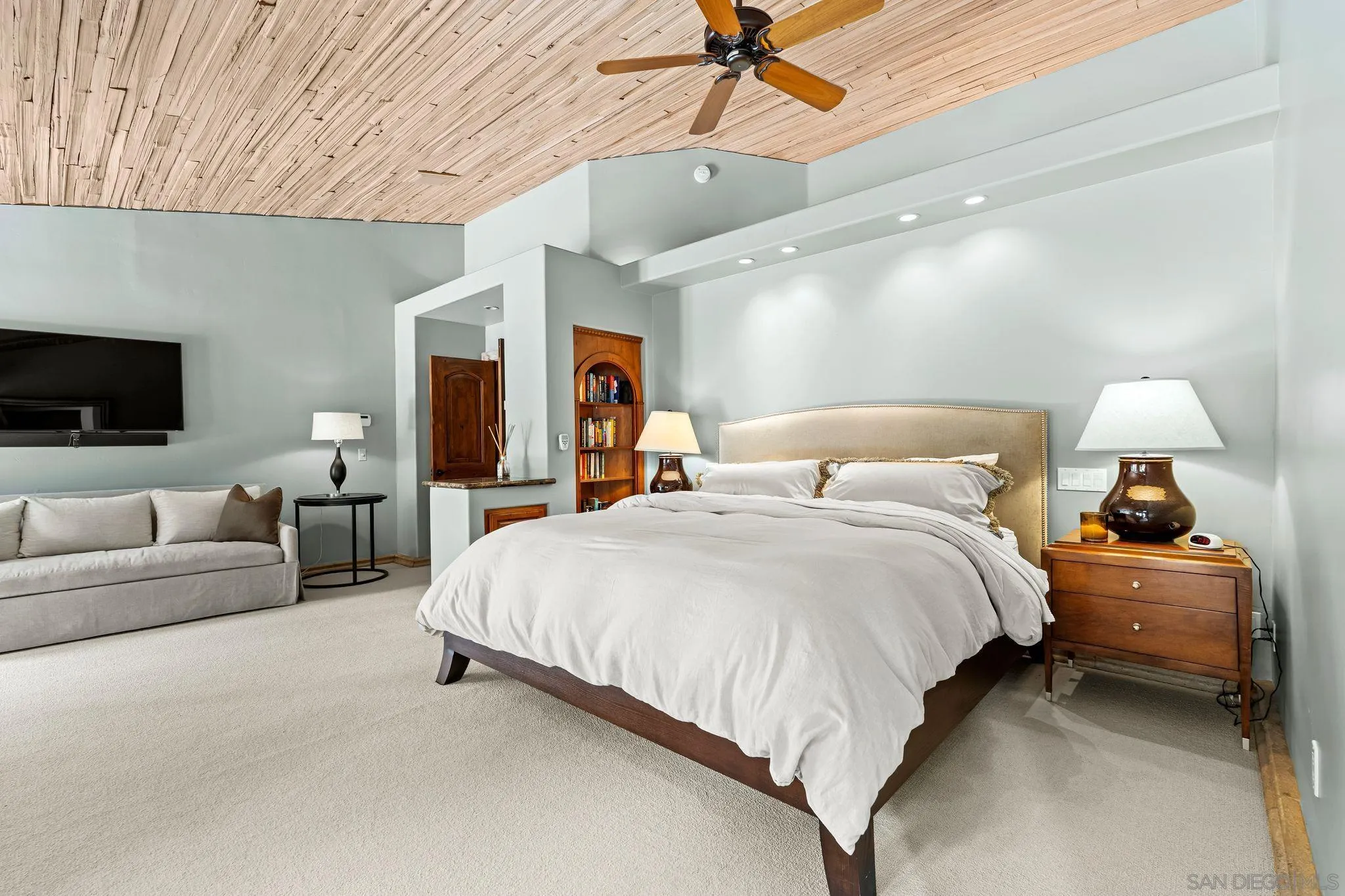 2969 Racetrack View Drive Del Mar, CA 92014 - Photo 25 of 59 a bedroom with bed and a chandelier