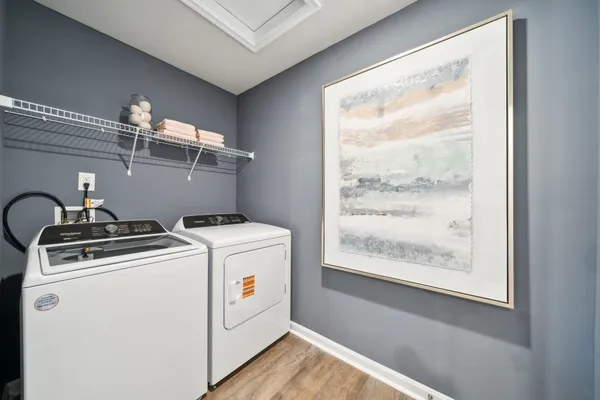 a utility room with dryer and washer