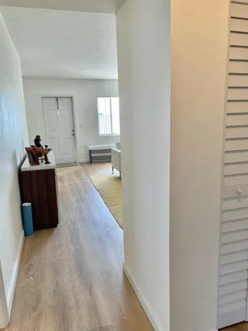 a bed room with a bed and a window