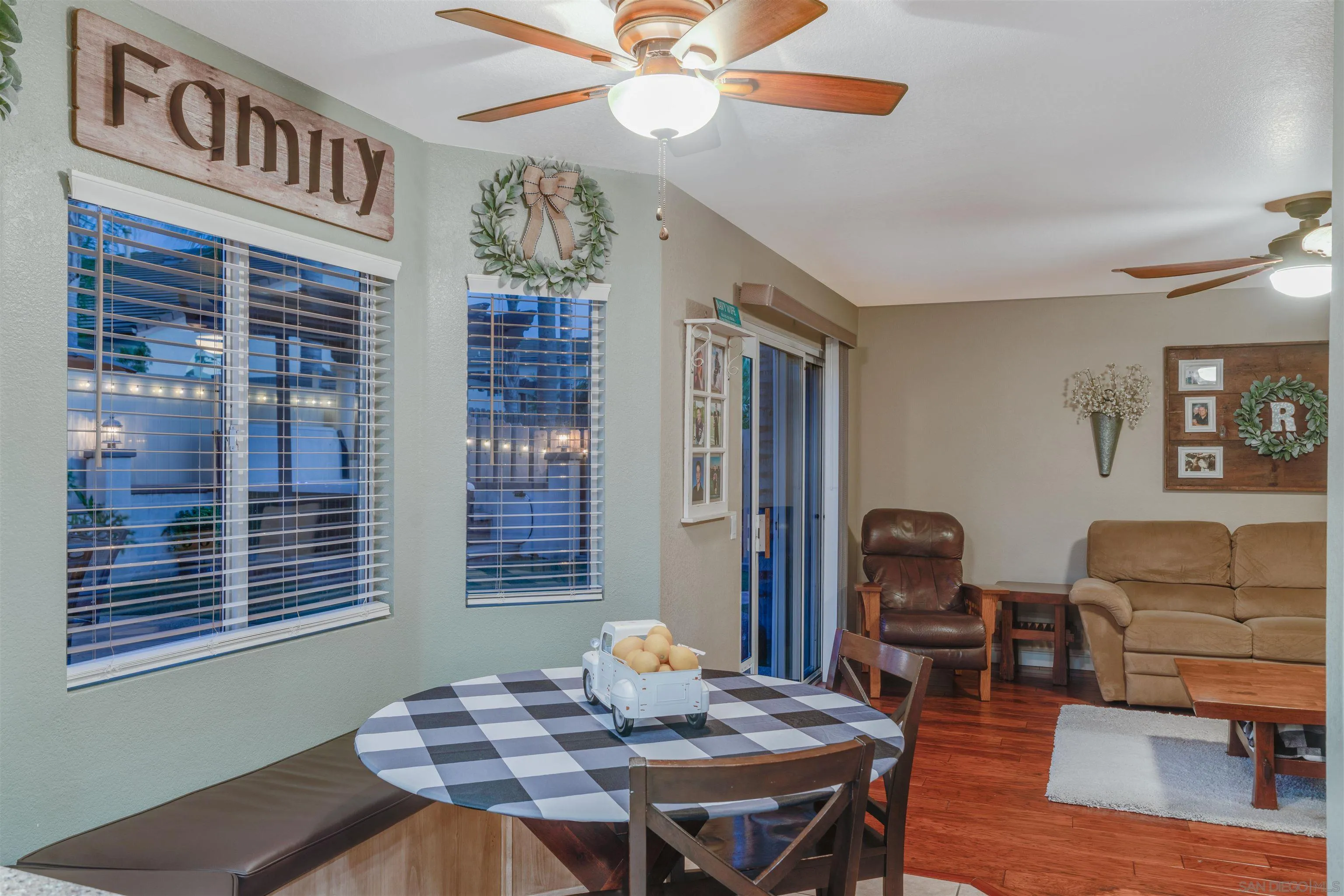 10229 Pinon Place Lakeside, CA 92040 - Photo 13 of 33 a view of a dining room with furniture window and wooden floor