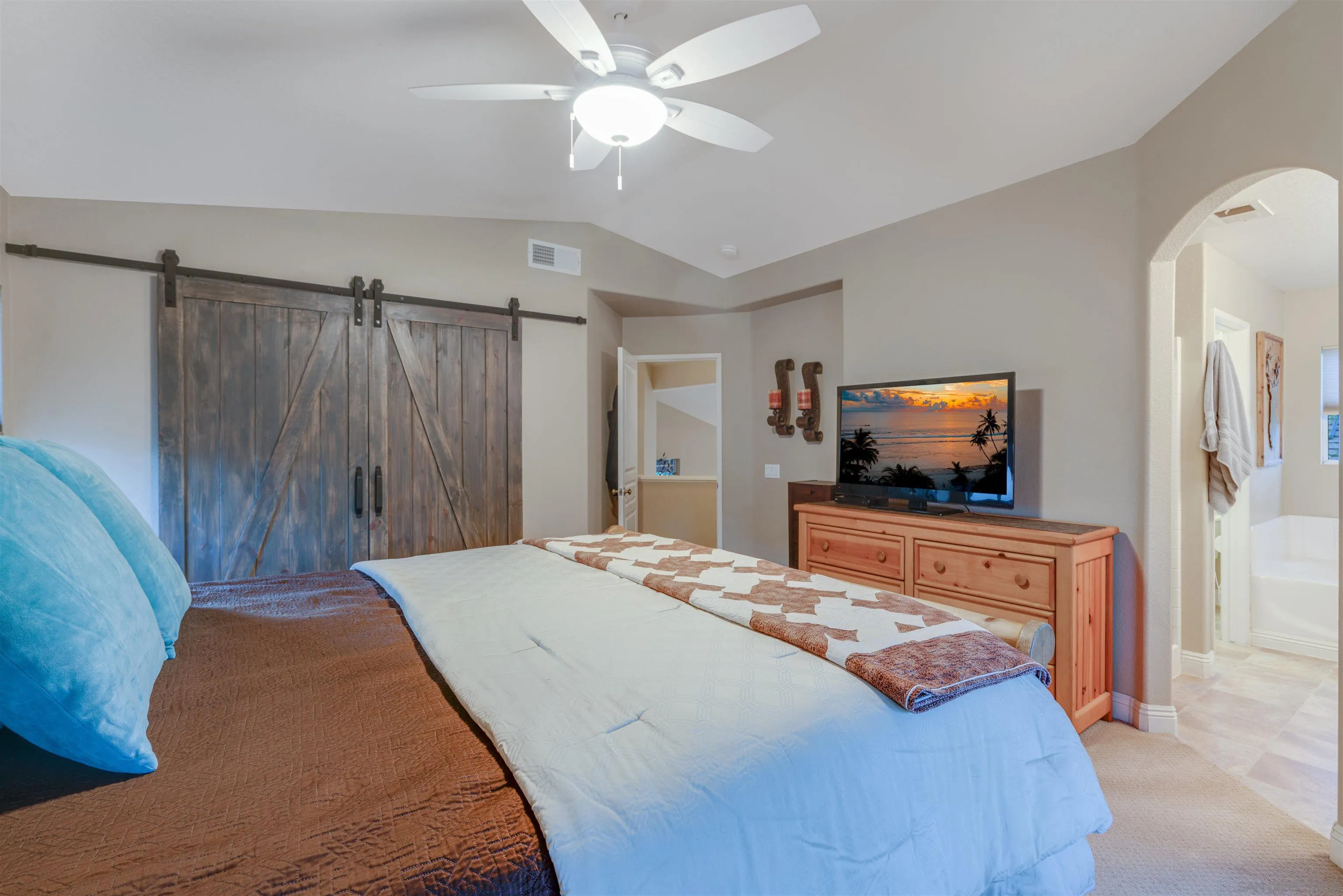 10229 Pinon Place Lakeside, CA 92040 - Photo 27 of 33 a bedroom with a bed and a flat screen tv