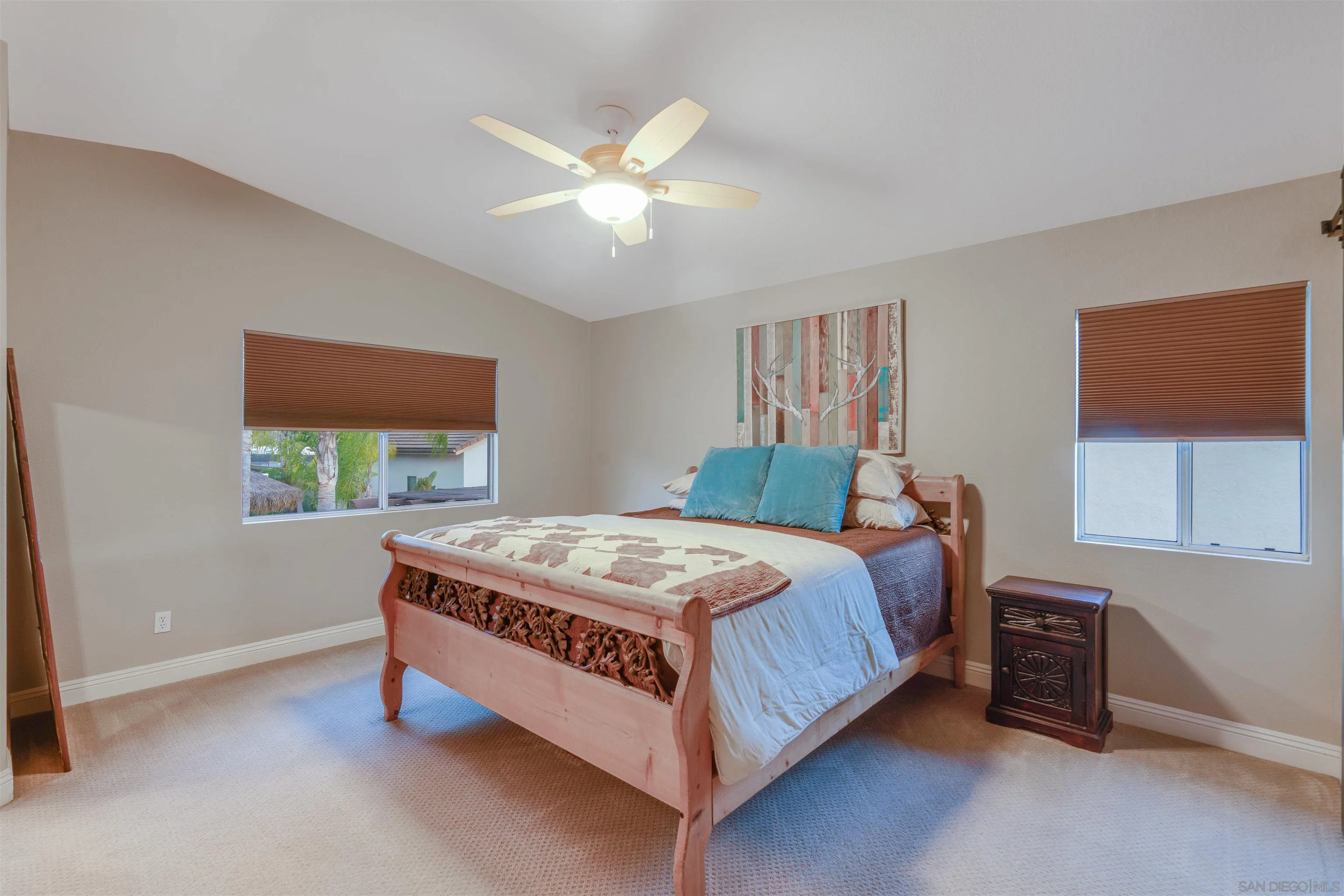 10229 Pinon Place Lakeside, CA 92040 - Photo 28 of 33 a bedroom with a bed and window
