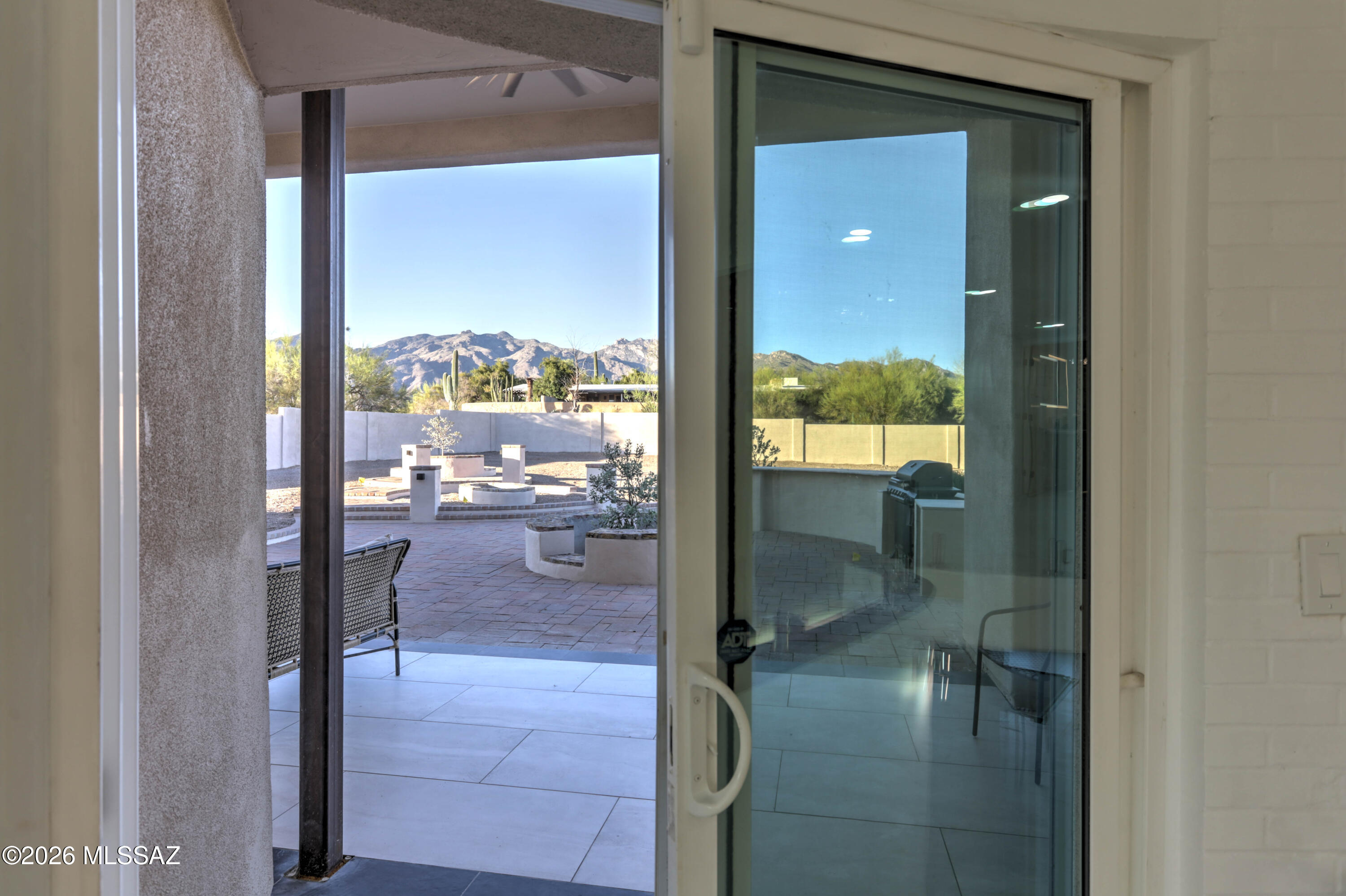 4939 East River Road Tucson, AZ 85718 - Photo 25 of 29 a bathroom with a glass shower door