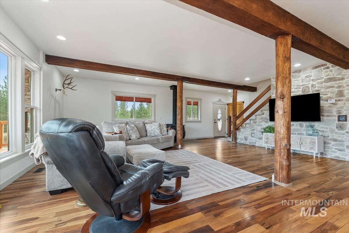 6 East Beck Road Garden Valley, ID 83622 - Photo 3 of 44 Living room with beamed ceiling, hardwood / wood-style floors, and recessed lighting