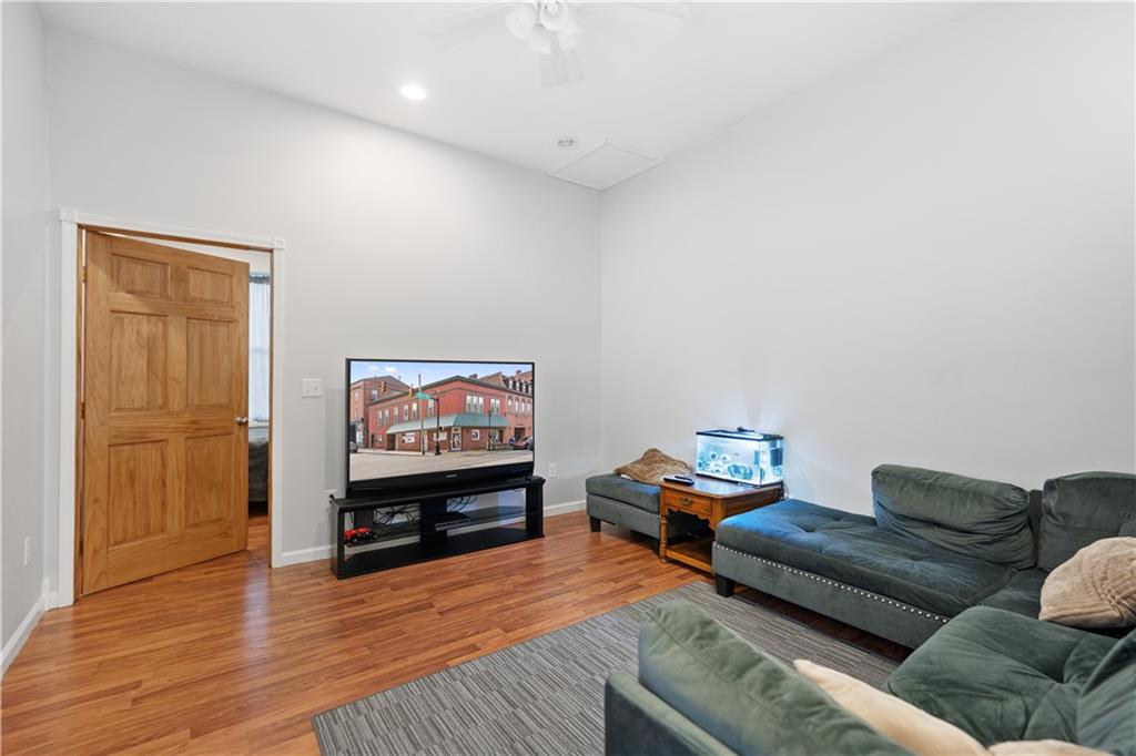 202 West Main Street Monongahela, PA 15063 - Photo 11 of 35 a living room with furniture and a flat screen tv