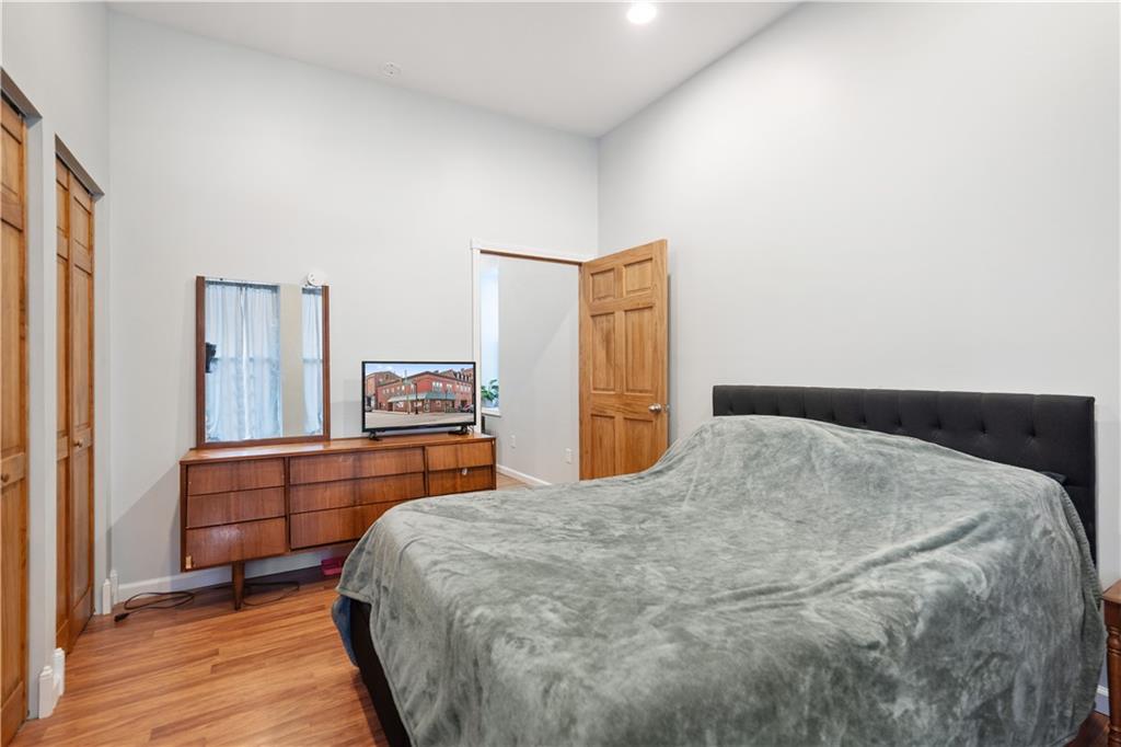 202 West Main Street Monongahela, PA 15063 - Photo 12 of 35 a bedroom with a bed and a dresser