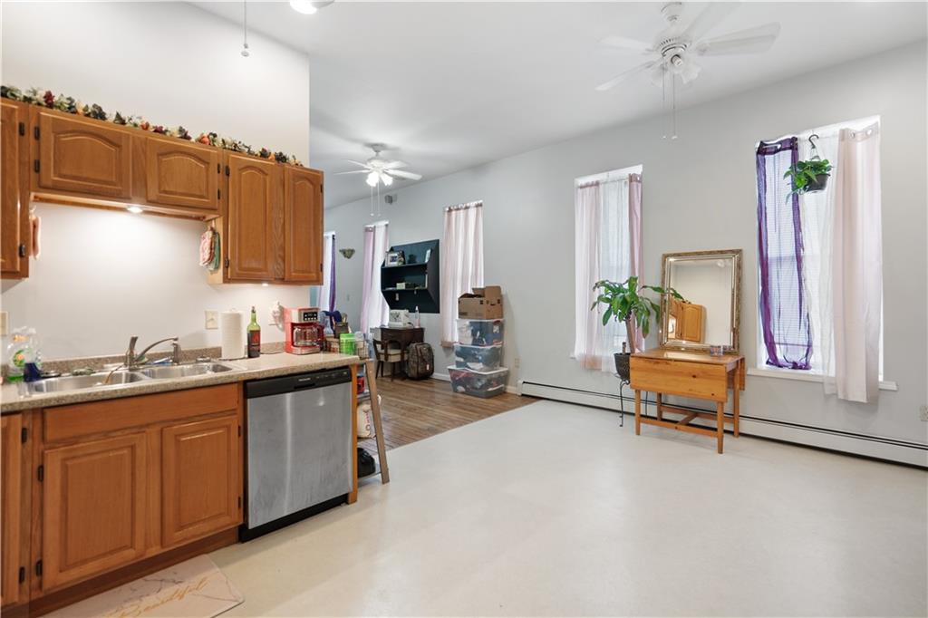 202 West Main Street Monongahela, PA 15063 - Photo 14 of 35 a kitchen with sink refrigerator and cabinets