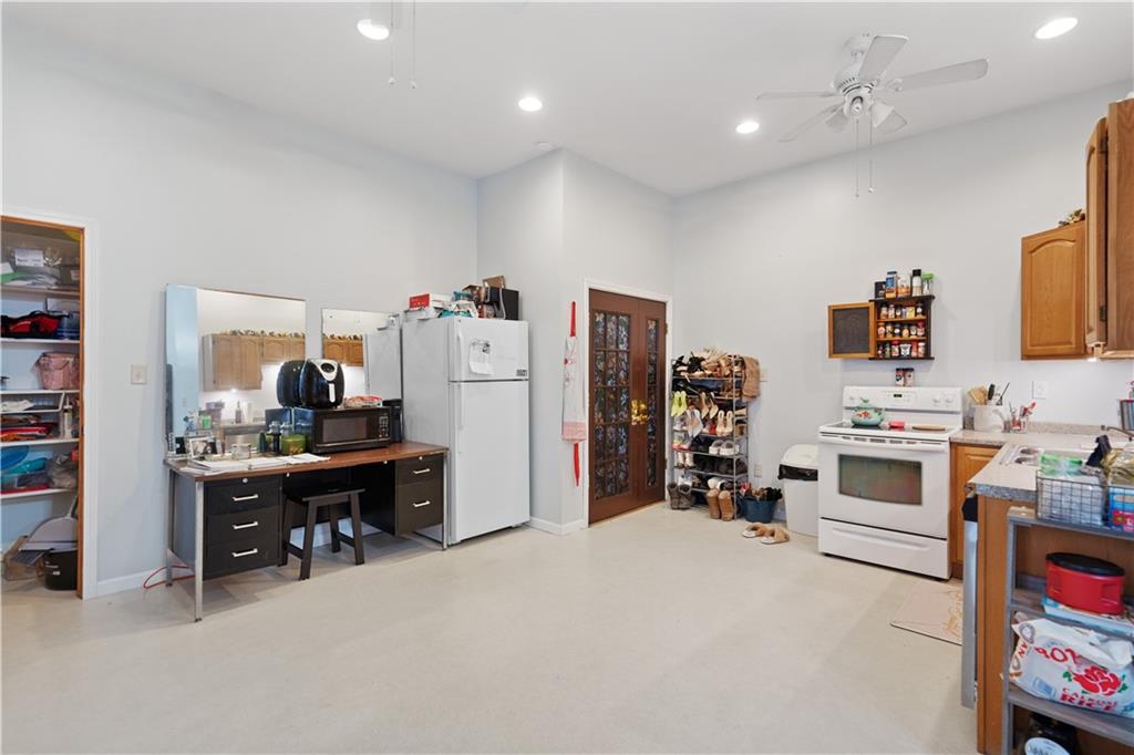 202 West Main Street Monongahela, PA 15063 - Photo 15 of 35 a view of a workspace with furniture and a flat screen tv