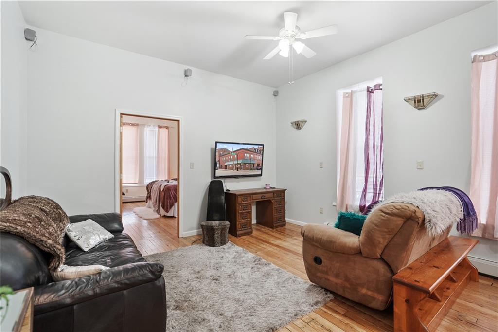202 West Main Street Monongahela, PA 15063 - Photo 17 of 35 a living room with furniture and a fireplace