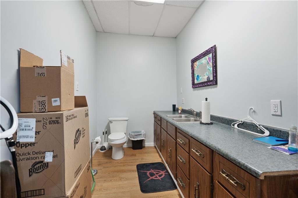 202 West Main Street Monongahela, PA 15063 - Photo 22 of 35 a bathroom with a sink a toilet and a mirror