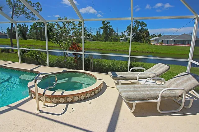 a bathroom with a sink double vanity and a mirror