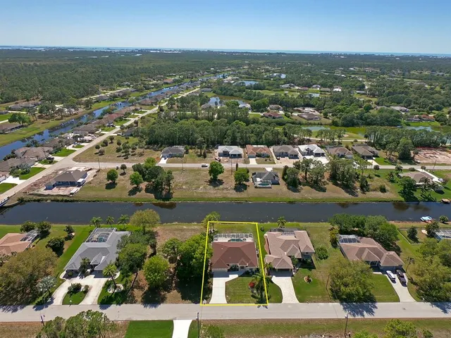 a white bath tub sitting next to a toilet