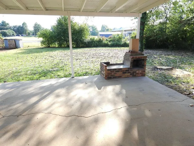 a view of a lake with a porch