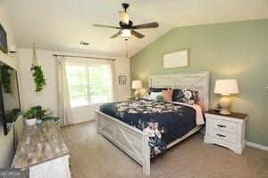 89 Copeland Road Newnan, GA 30263 - Photo 11 of 30 a bedroom with a bed and a dresser