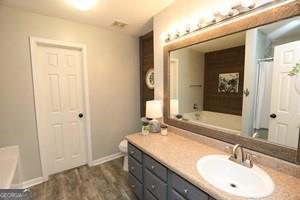 89 Copeland Road Newnan, GA 30263 - Photo 14 of 30 a bathroom with a sink and a mirror