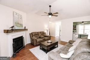 89 Copeland Road Newnan, GA 30263 - Photo 6 of 30 a living room with furniture and a fireplace