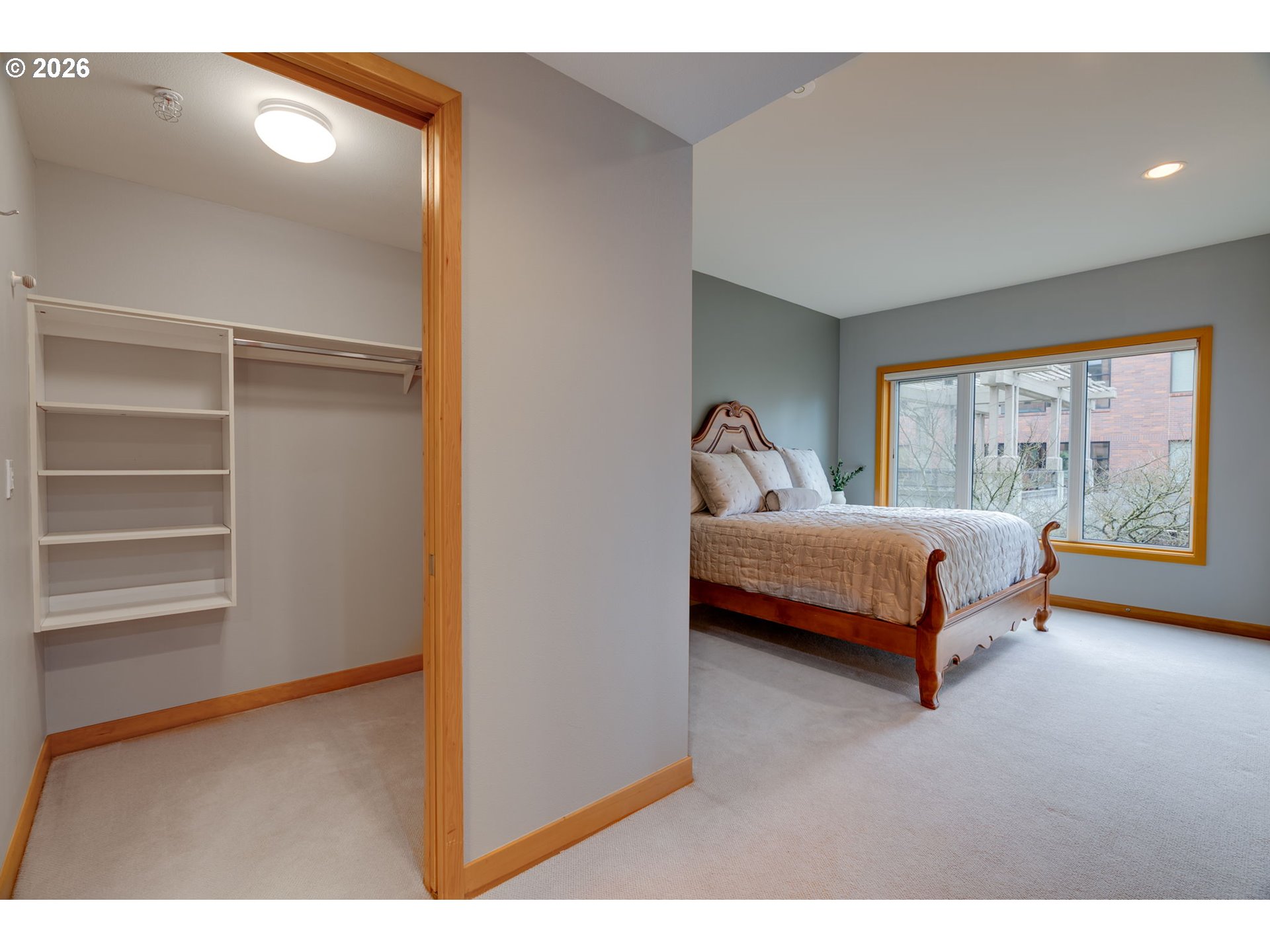 300 West 8th Street, Unit 236E Vancouver, WA 98660 - Photo 21 of 46 a bedroom with a bed and a large window