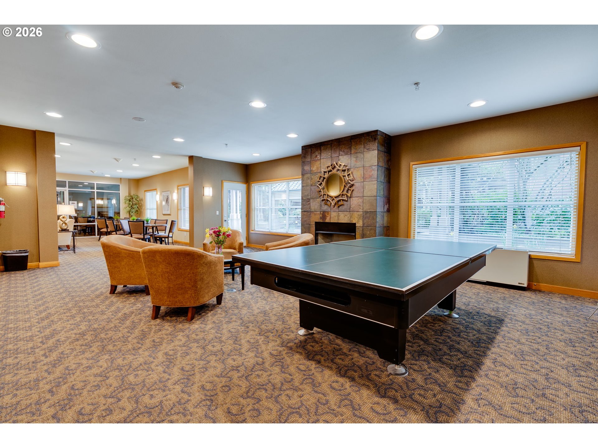 300 West 8th Street, Unit 236E Vancouver, WA 98660 - Photo 31 of 46 a living room with furniture pool table and a large window