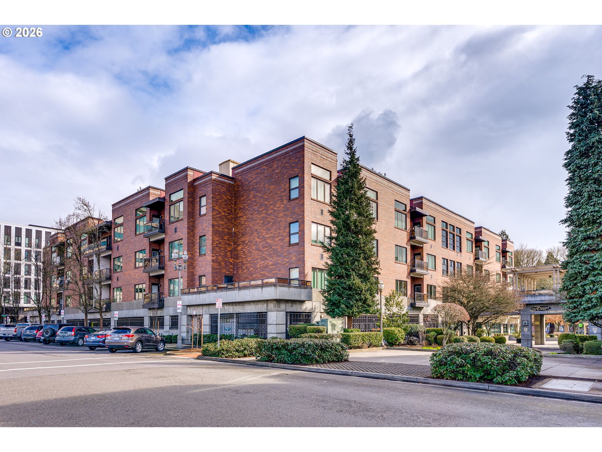 300 West 8th Street, Unit 236E Vancouver, WA 98660 - Photo 34 of 46 a city street lined with buildings and trees