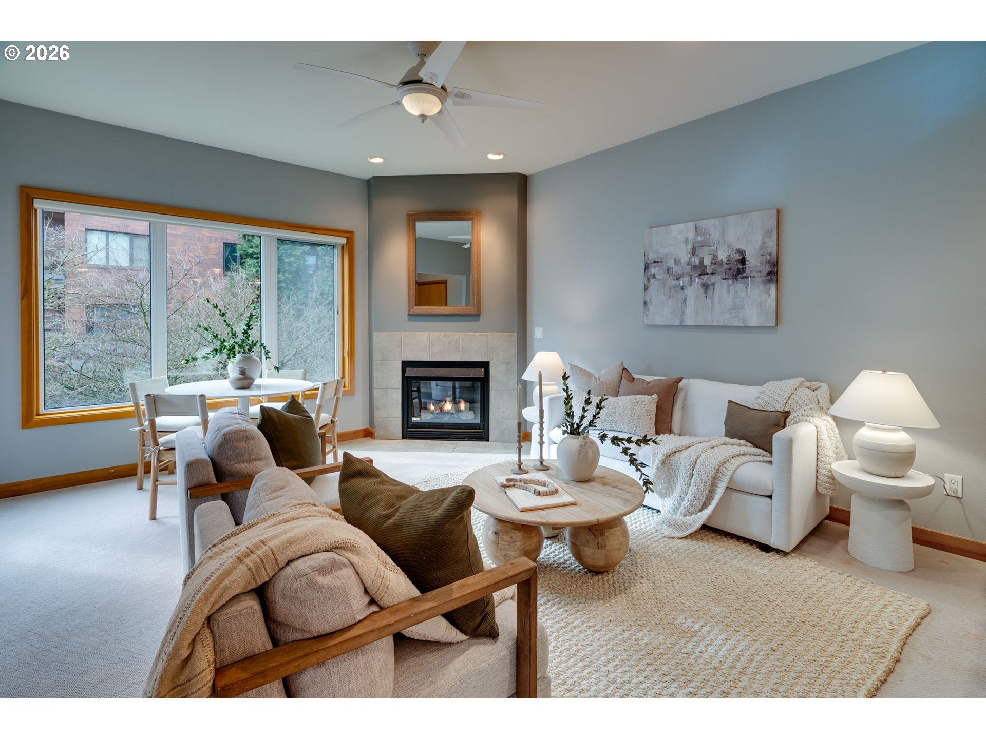 300 West 8th Street, Unit 236E Vancouver, WA 98660 - Photo 10 of 46 a living room with furniture and a fireplace