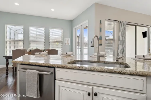 a bedroom with a bed and balcony