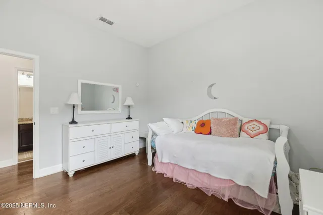 an aerial view of a house with swimming pool