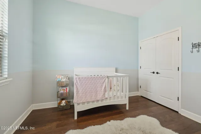 a view of a building with a small yard