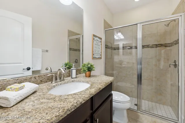 a view of a house with a tub and chairs