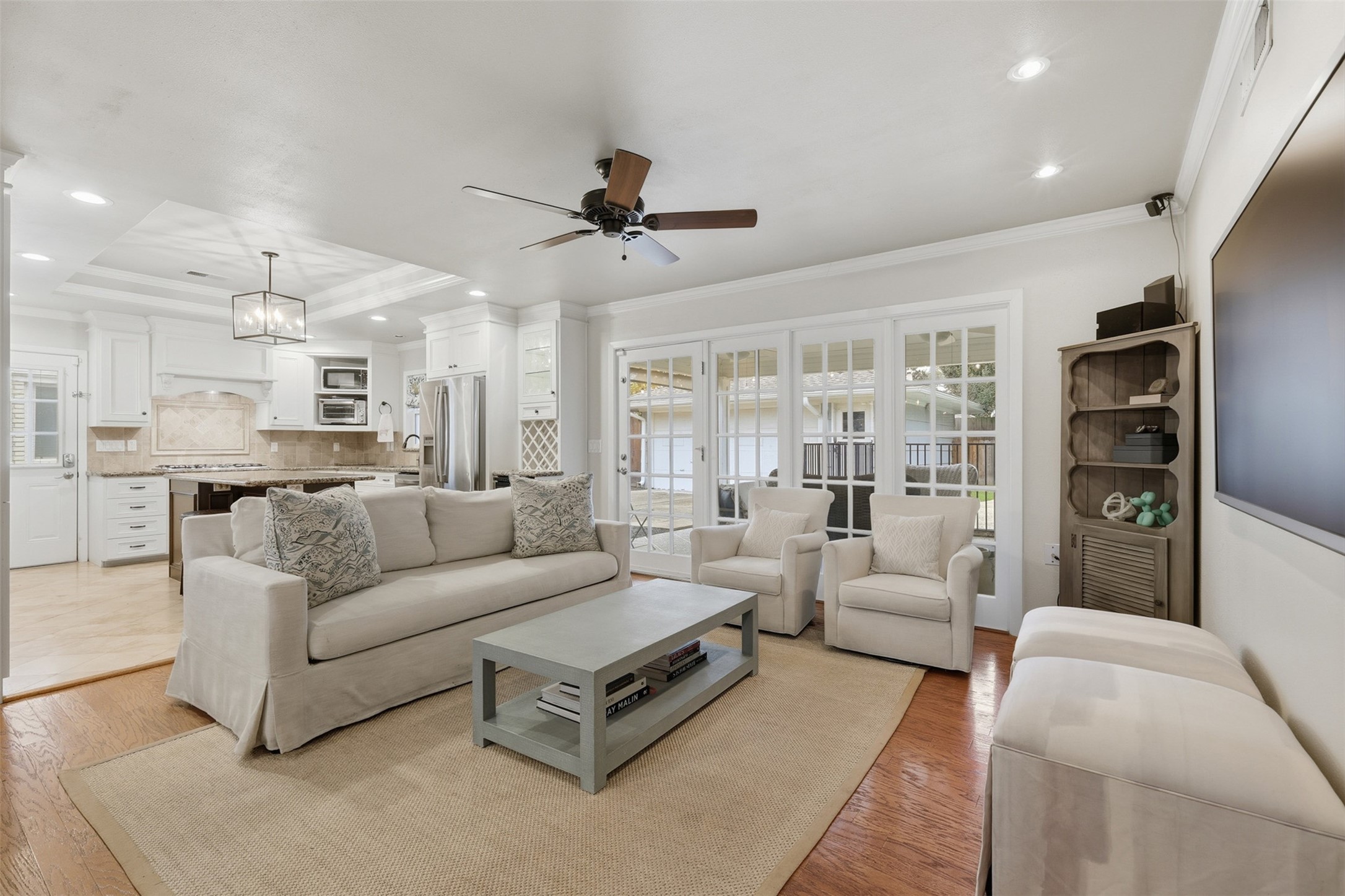 6236 Locke Lane Houston, TX 77057 - Photo 12 of 35 The family room features large windows that overlook the backyard, and is open to the kitchen!