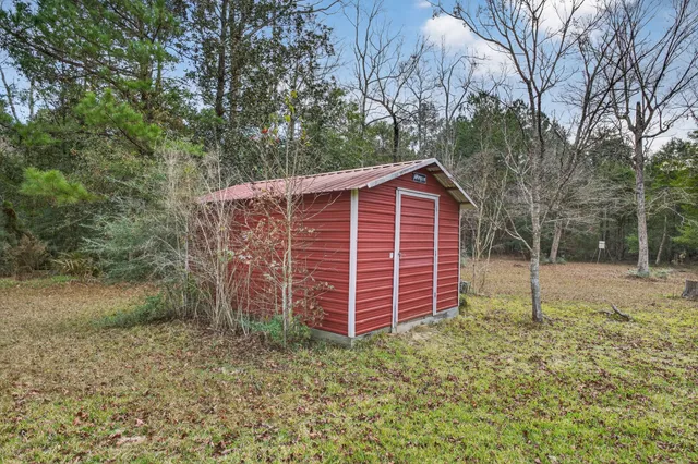 a backyard of a house with lots of green space