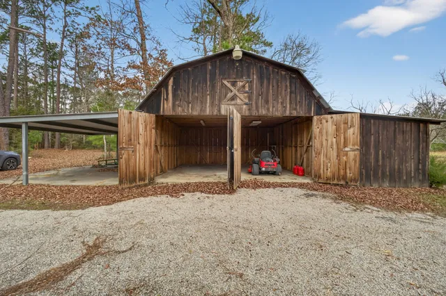 a view of a lake with a yard