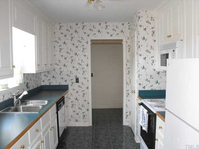 4301 Rains Crossroads Road Princeton, NC 27569 - Photo 5 of 12 SUNNY KITCHEN WITH GORGEOUS CABINETS & CERAMIC TILE FLOOR Kitchen