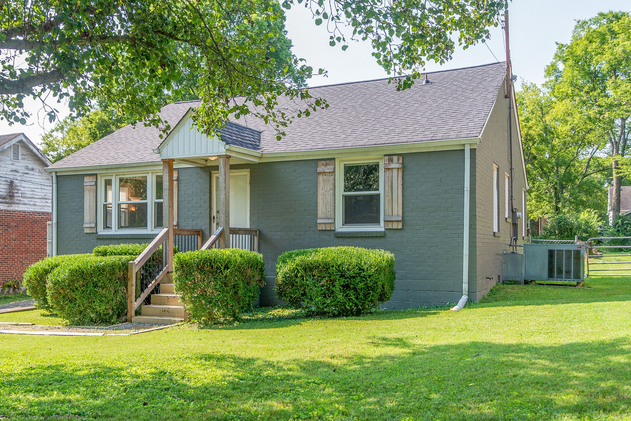 212 Neelys Bend Road Madison, TN 37115 - Photo 2 of 24 a view of a house with a yard and plants