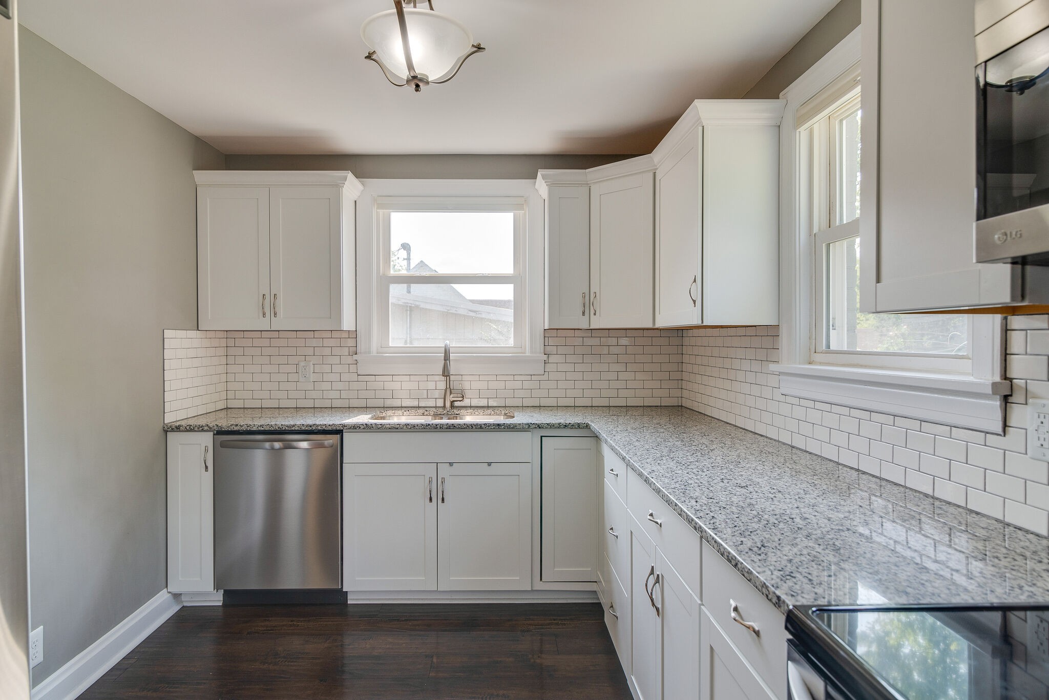 212 Neelys Bend Road Madison, TN 37115 - Photo 11 of 24 a kitchen with sink cabinets and window